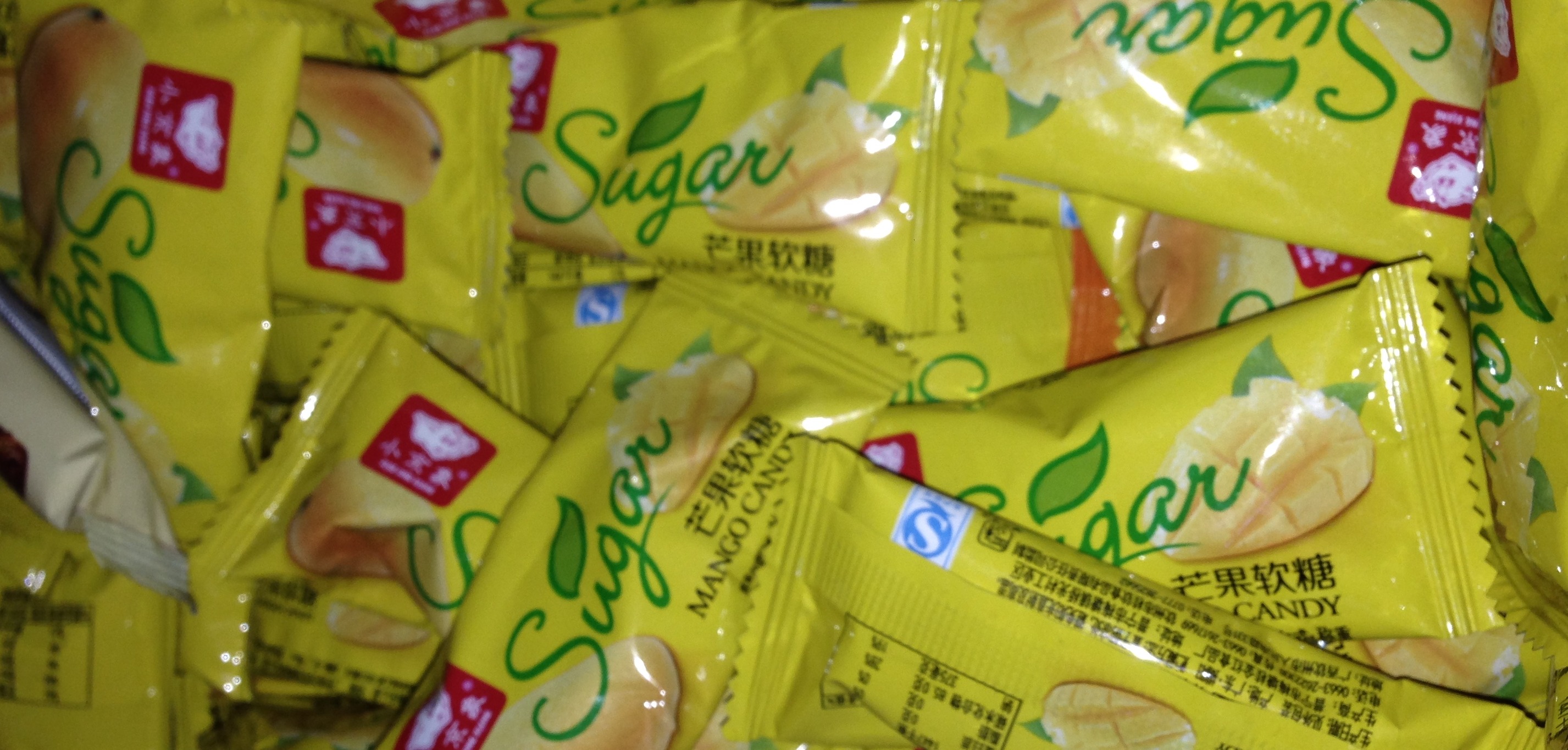 Сахар в леденцах купить. Конфеты Sugar Mango Candy. Мармеладные конфеты манго. Китайские жевательные конфеты манго. Sugar Mango Candy конфеты состав.